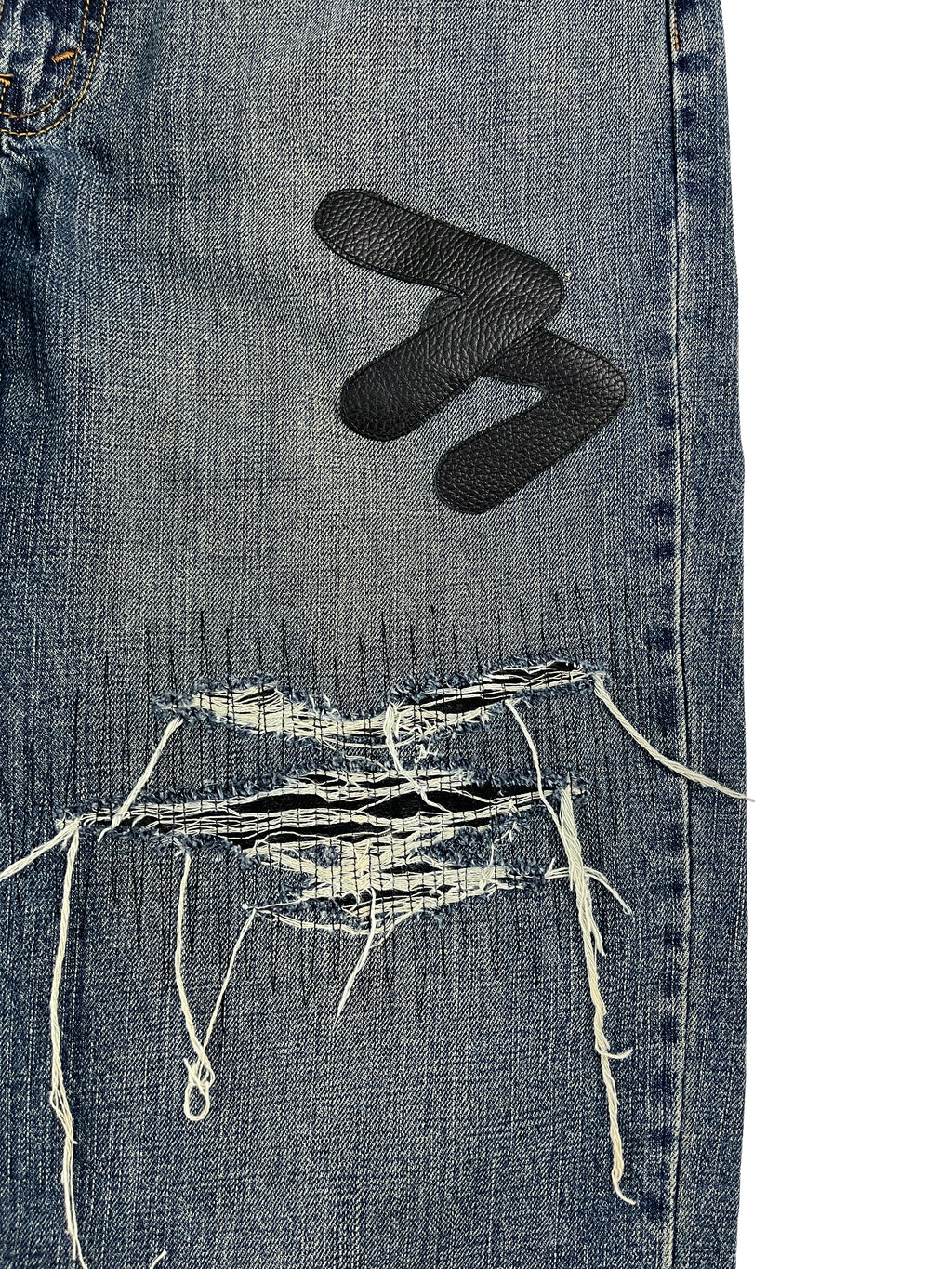 #52 Leather Patch Distressed Denim