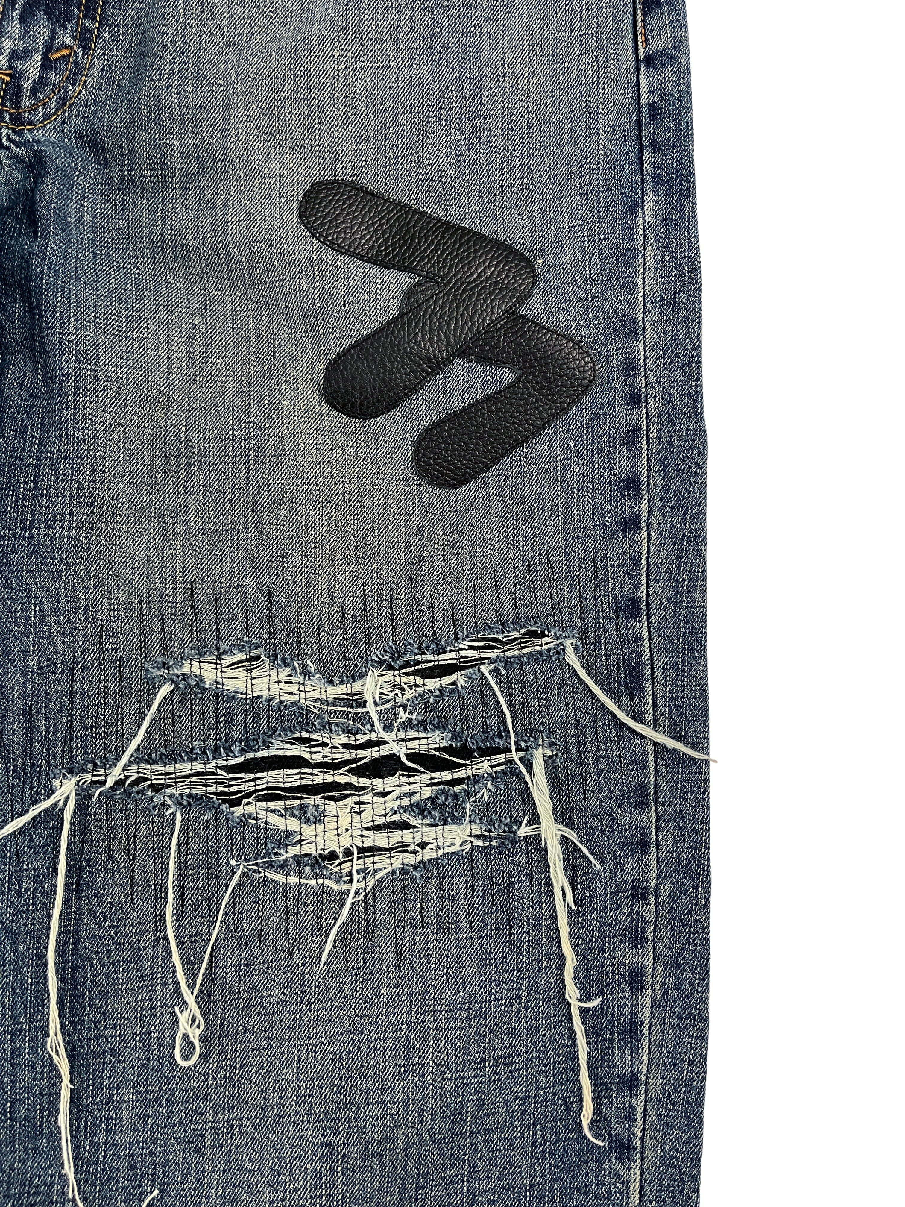 #52 Leather Patch Distressed Denim