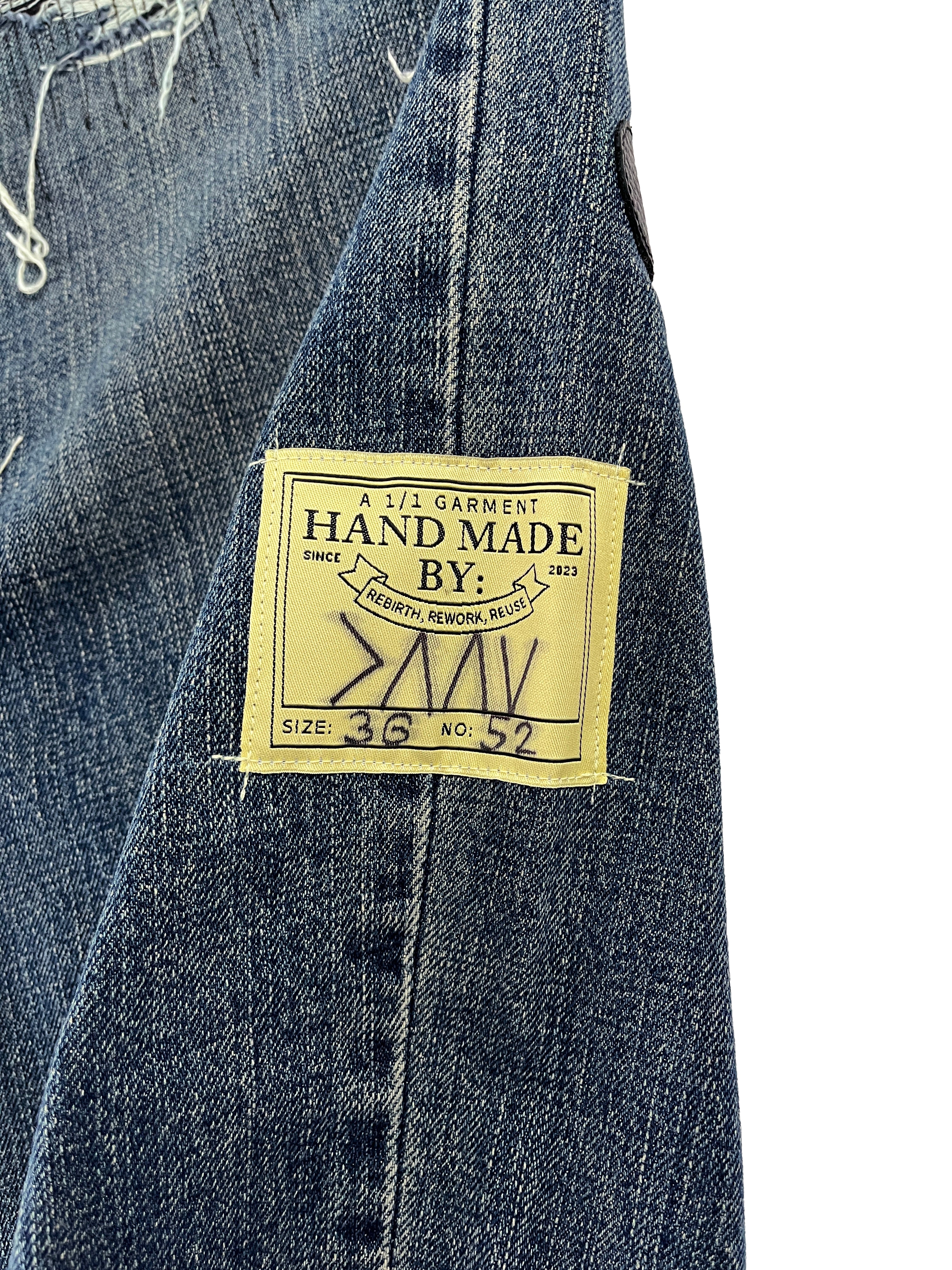 #52 Leather Patch Distressed Denim