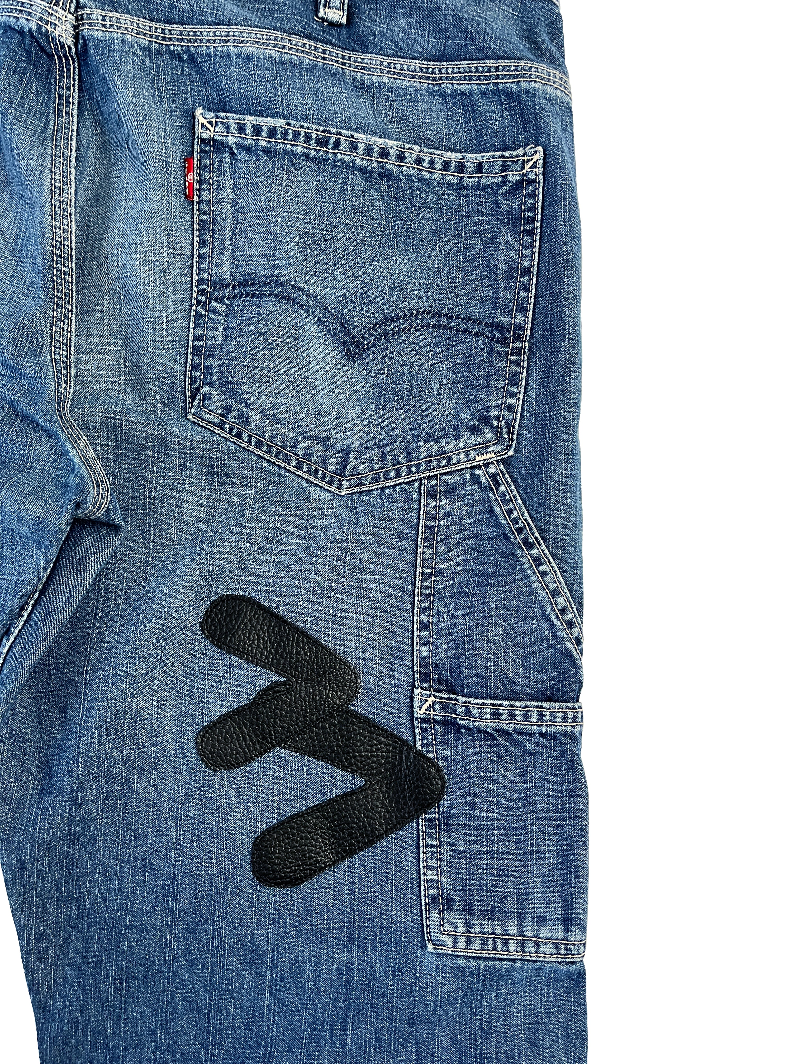 #51 Leather Patch Distressed Denim