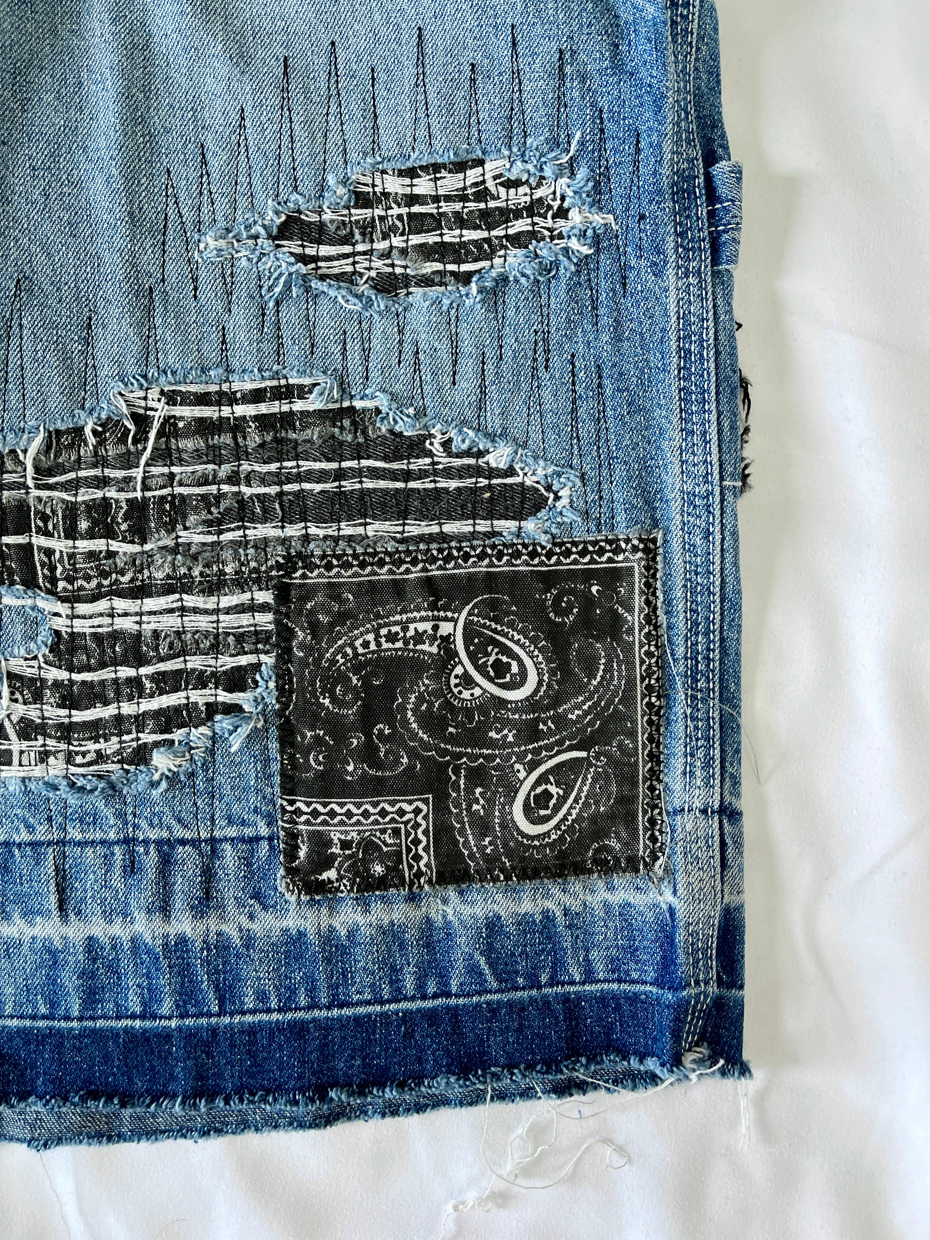 #40 Distressed Patchwork Denim