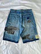 #40 Distressed Patchwork Denim
